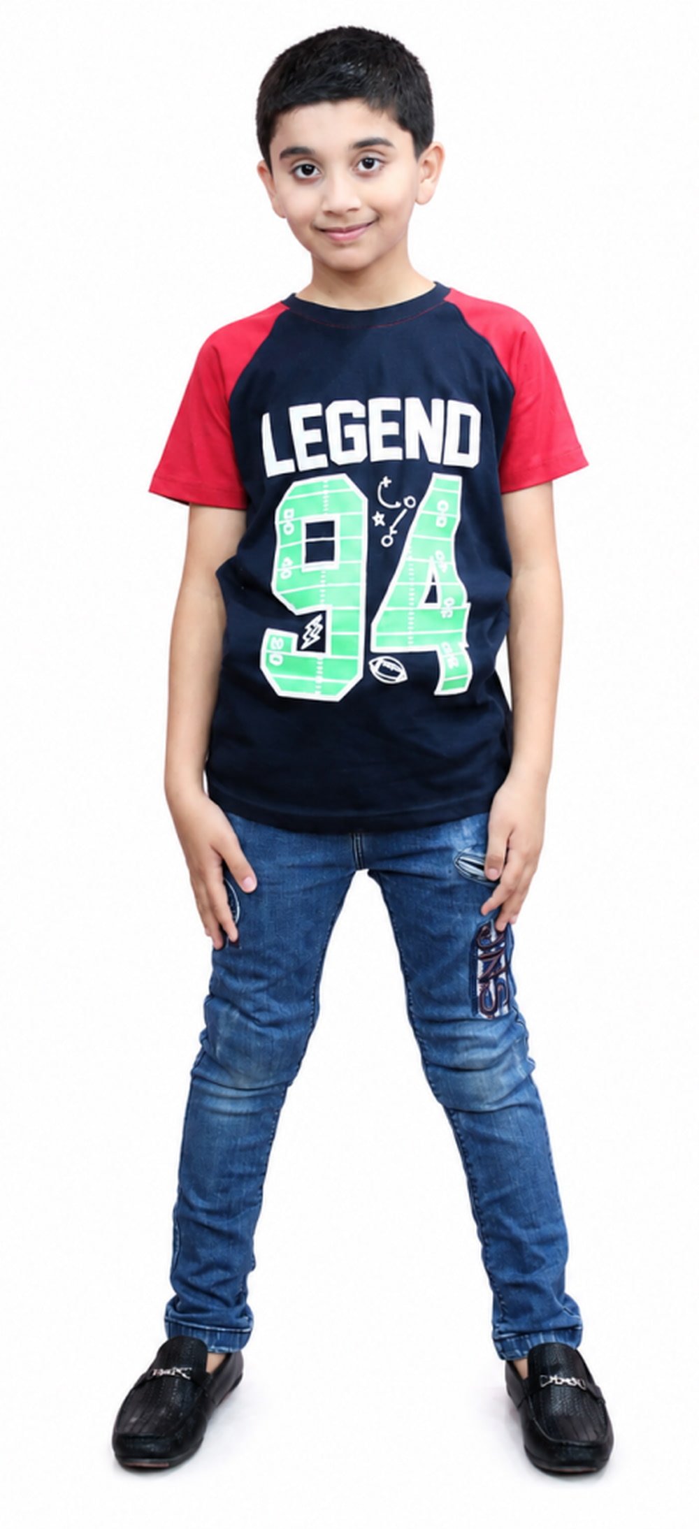 Boy wearing a navy blue and red Legend 94 graphic cotton T-shirt with jeans
