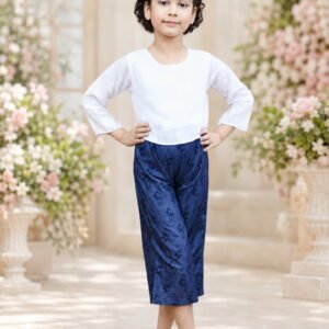 Full view of girls white and navy jumpsuit