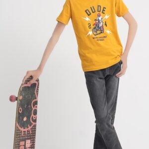 Boy wearing a mustard yellow Dude 24 cotton T-shirt while holding a skateboard