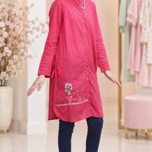 Girl wearing a fuchsia pink embroidered kurti with scooter and floral design