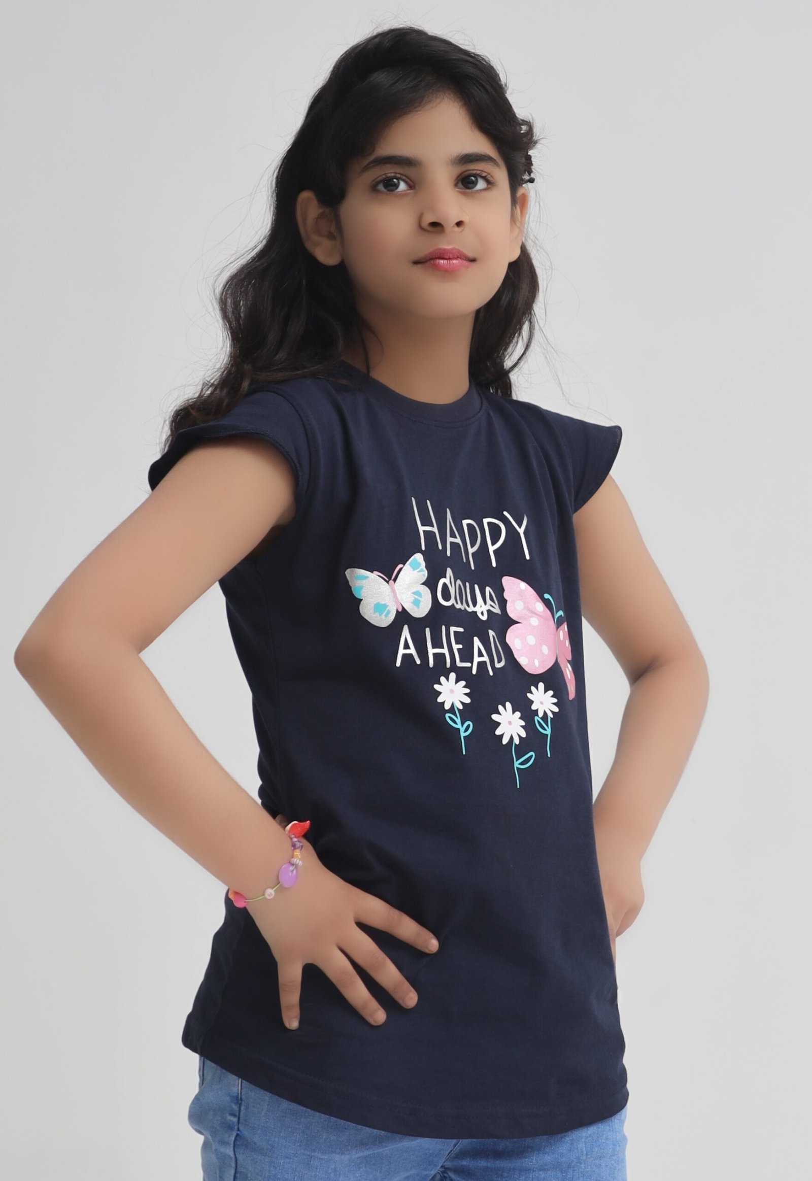 Front view of girls navy blue Happy Days Ahead butterfly graphic T-shirt